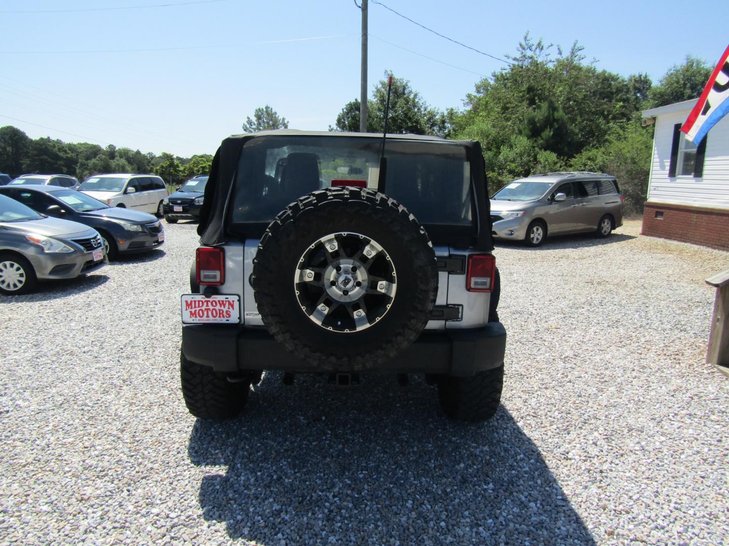 2014 Silver /Gray Jeep Wrangler Sport 4WD (1C4AJWAG5EL) with an 3.6L V6 DOHC 24V FFV engine, Automatic transmission, located at 15016 S Hwy 231, Midland City, AL, 36350, (334) 983-3001, 31.306210, -85.495277 - Photo#5